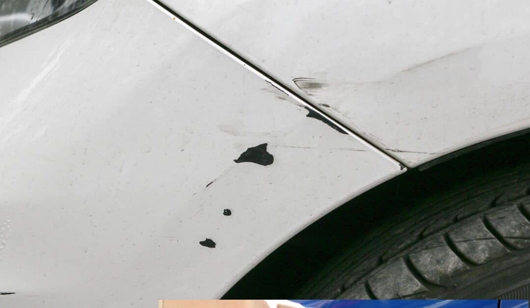 Close-up of chipped car paint on a white vehicle before repair in Delray Beach